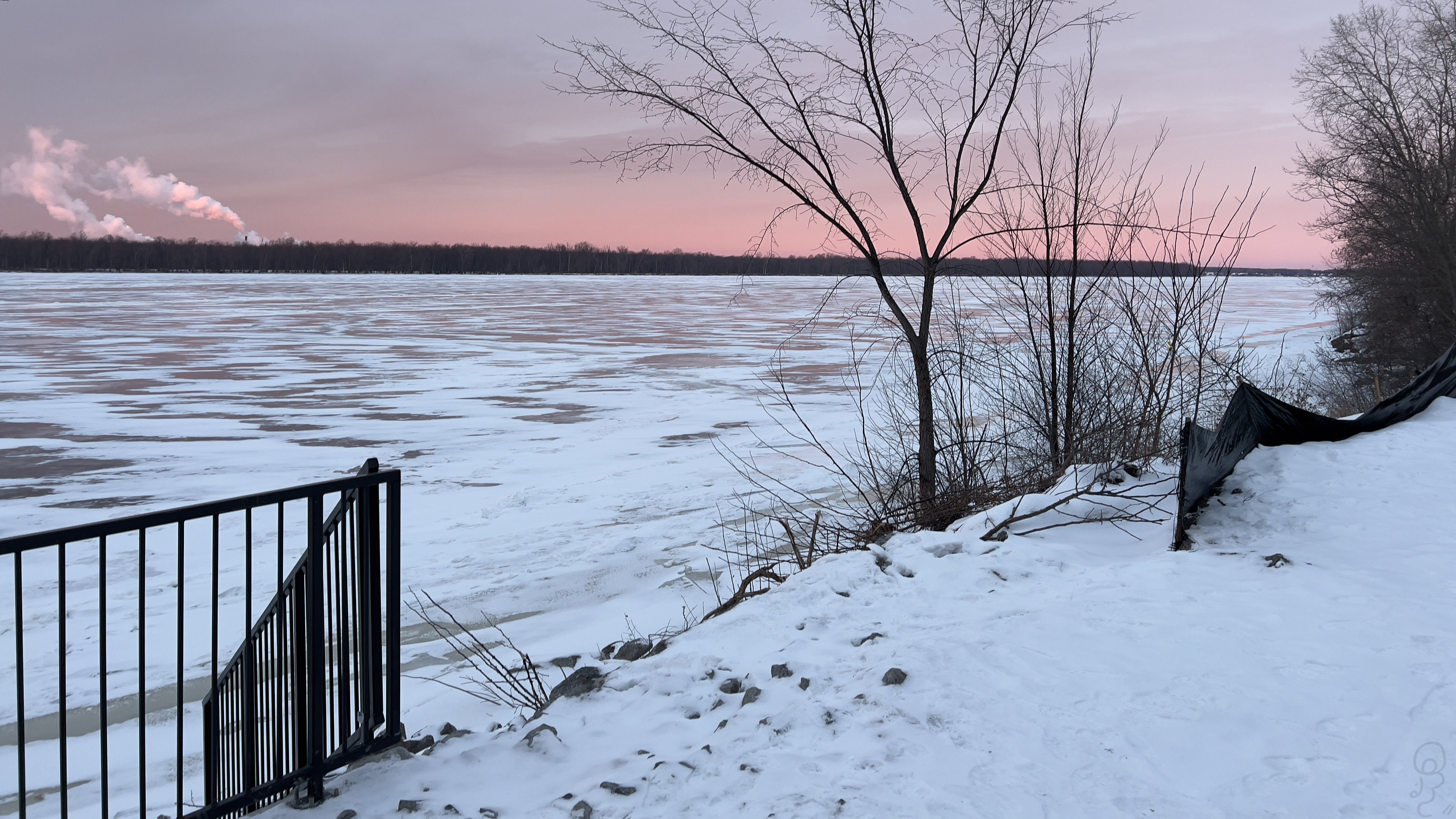 An image of The Ottawa River in winter, slightly frozen over