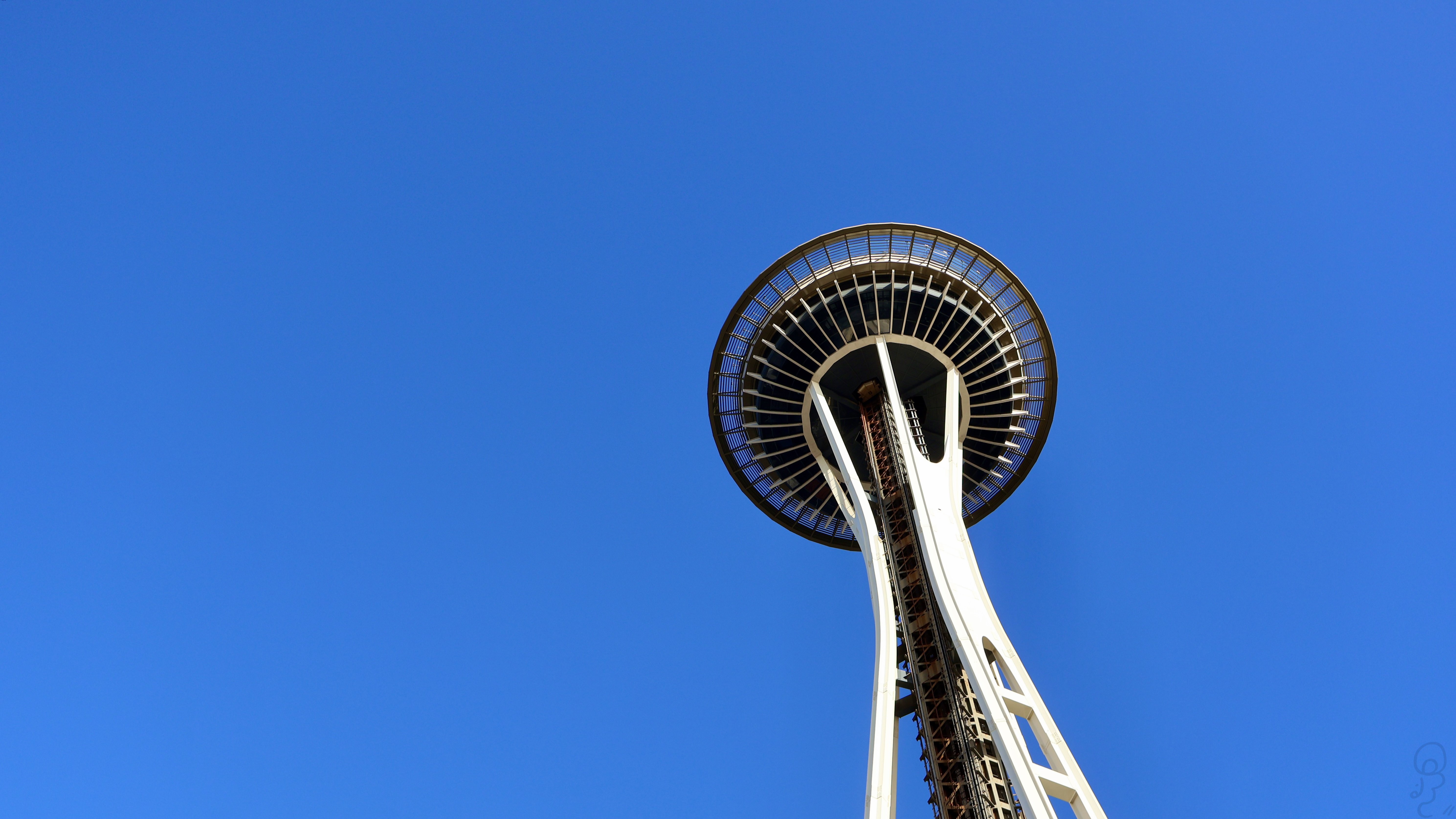 An image of A picture of the Space Needle in Seattle on a blue sky