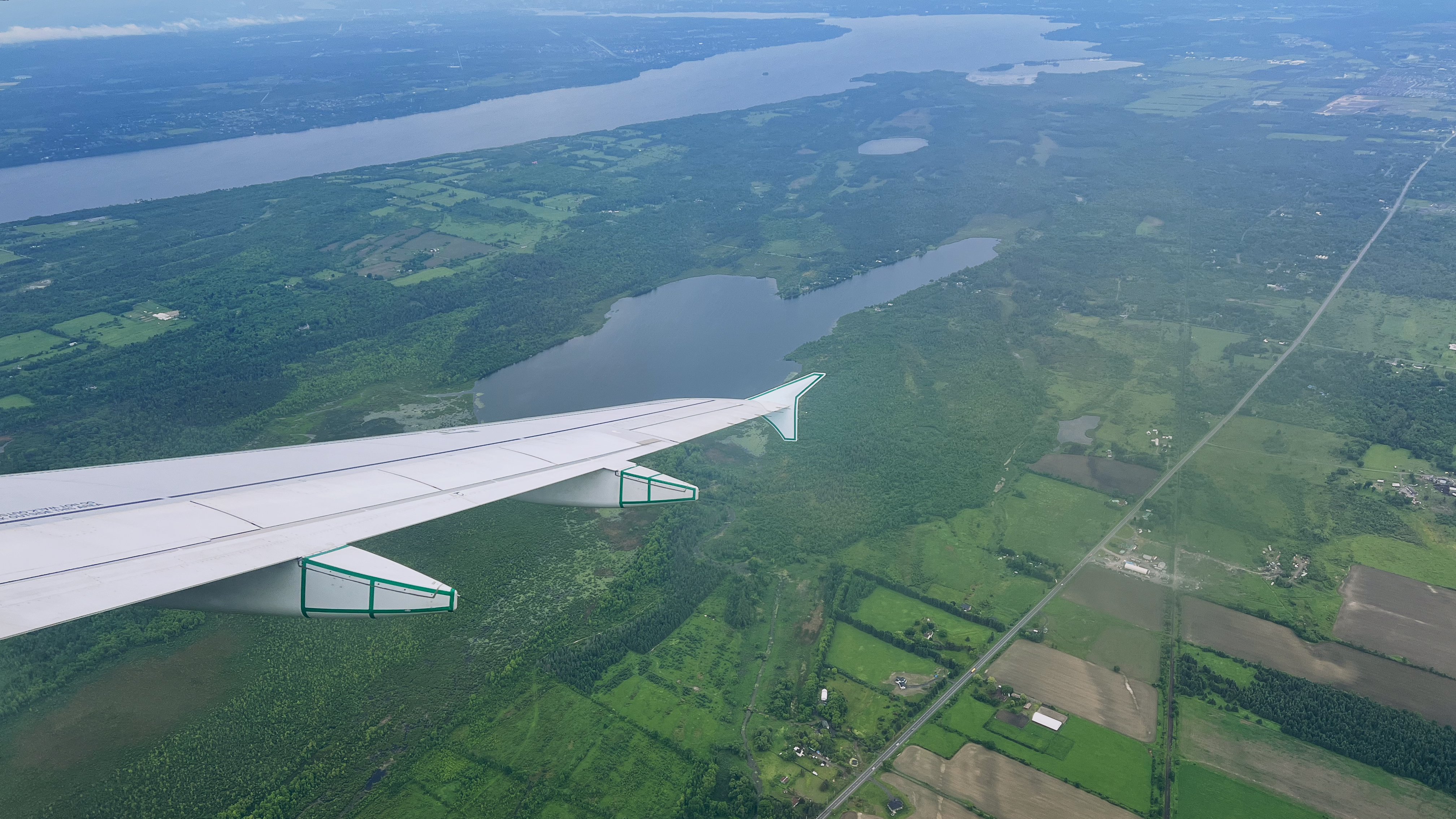 An image of A picture of an airplane coming in for a landing at Toronto Airport